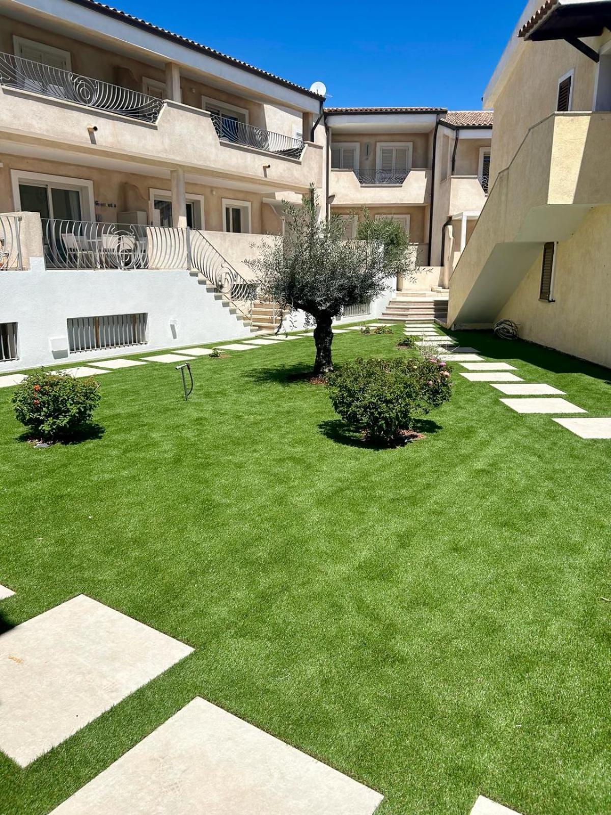 Appartamento Incantevole Con Piscina Palau Kültér fotó